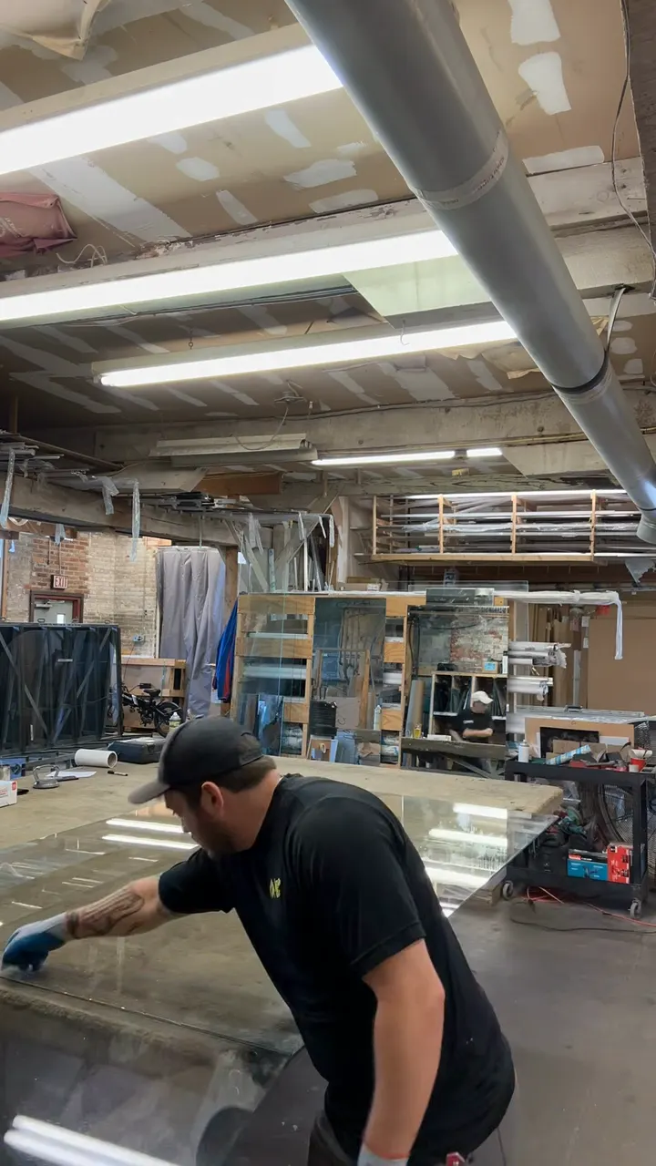 Racked glass stock in the Mesko warehouse, where sheets are pulled and cut to size.